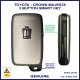 Image shows the emergency release button and Crown logo on the back of the key
