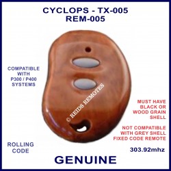 Cyclops TX-05 2 grey button wood grain kideny shaped car alarm remote