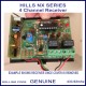 Hills NX Series alarm receiver unit with cover removed to reveal progrmming button and circuit board